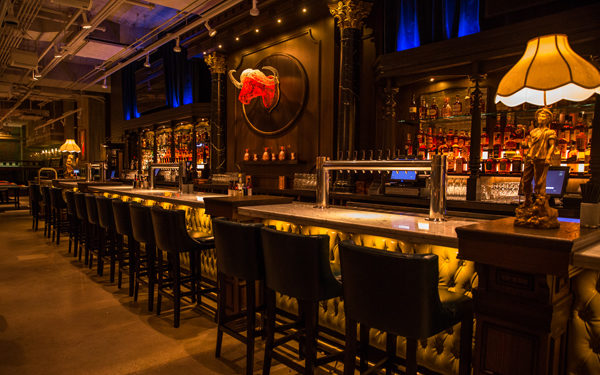 The bar at Bounce Chicago, USA. Interiors designed by Russell Sage Studio Ltd.