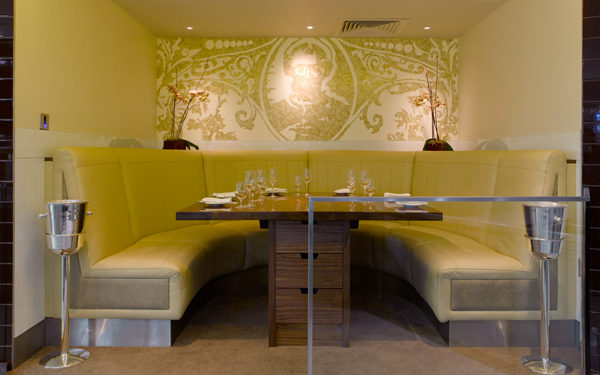 Banquette seating at Gordon Ramsay's Petrus, London. Interiors designed by Russell Sage Studio Ltd.
