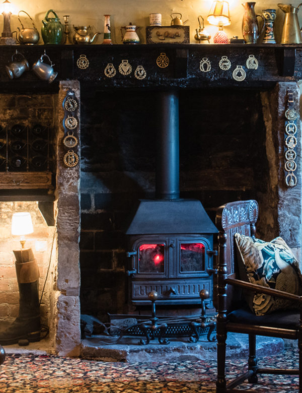 Woodburner at The Bull. Interiors designed by Russell Sage Studio Ltd.